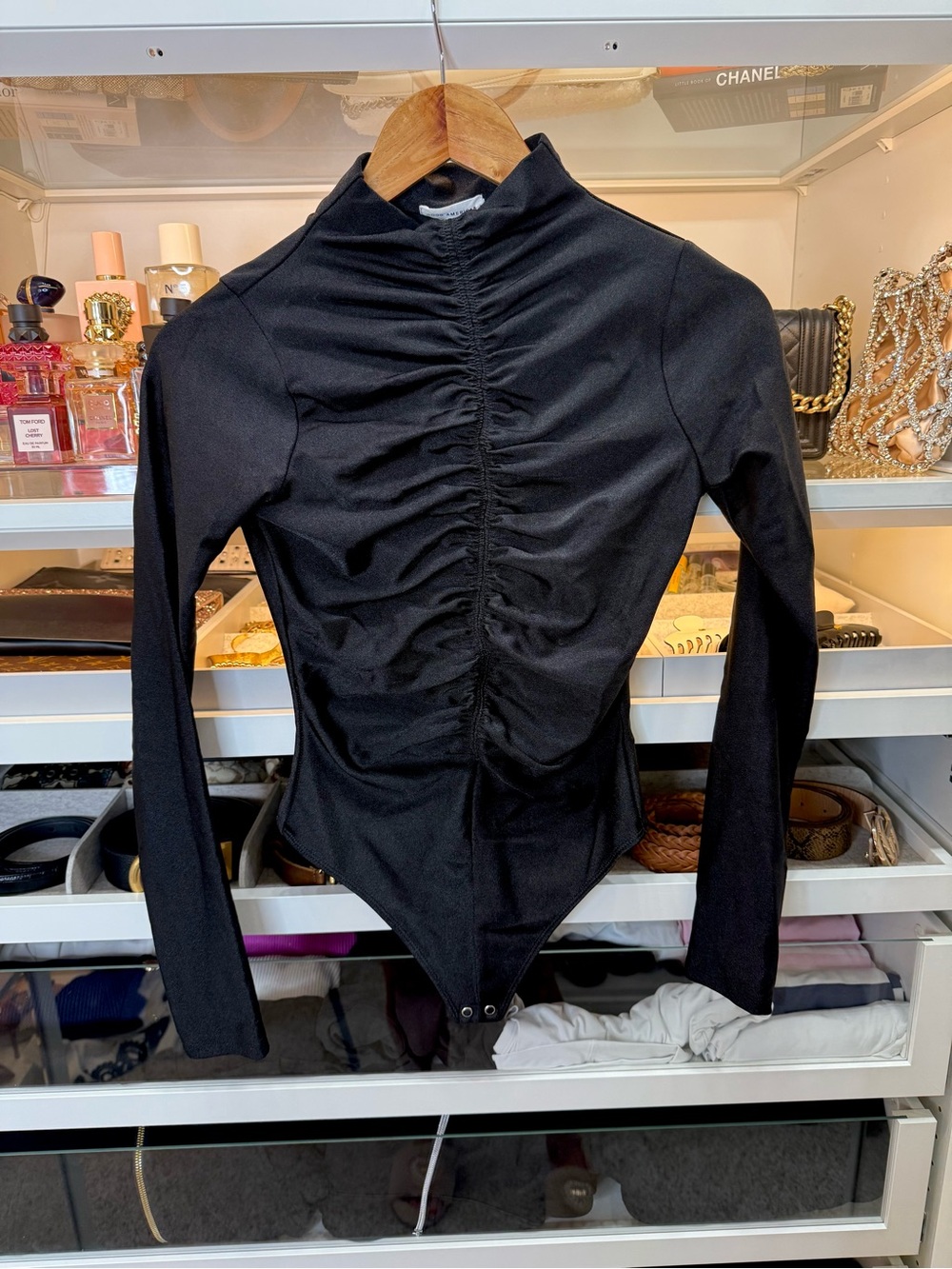 Good American black ruched bodysuit with long sleeves and high cowl neck
